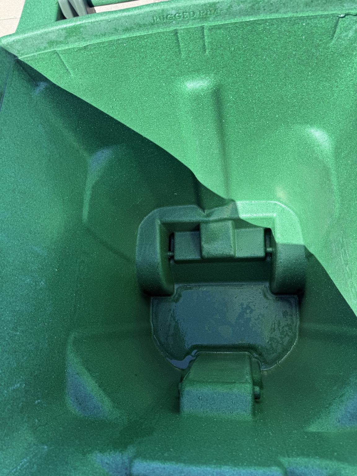 Green bin interior after cleaning